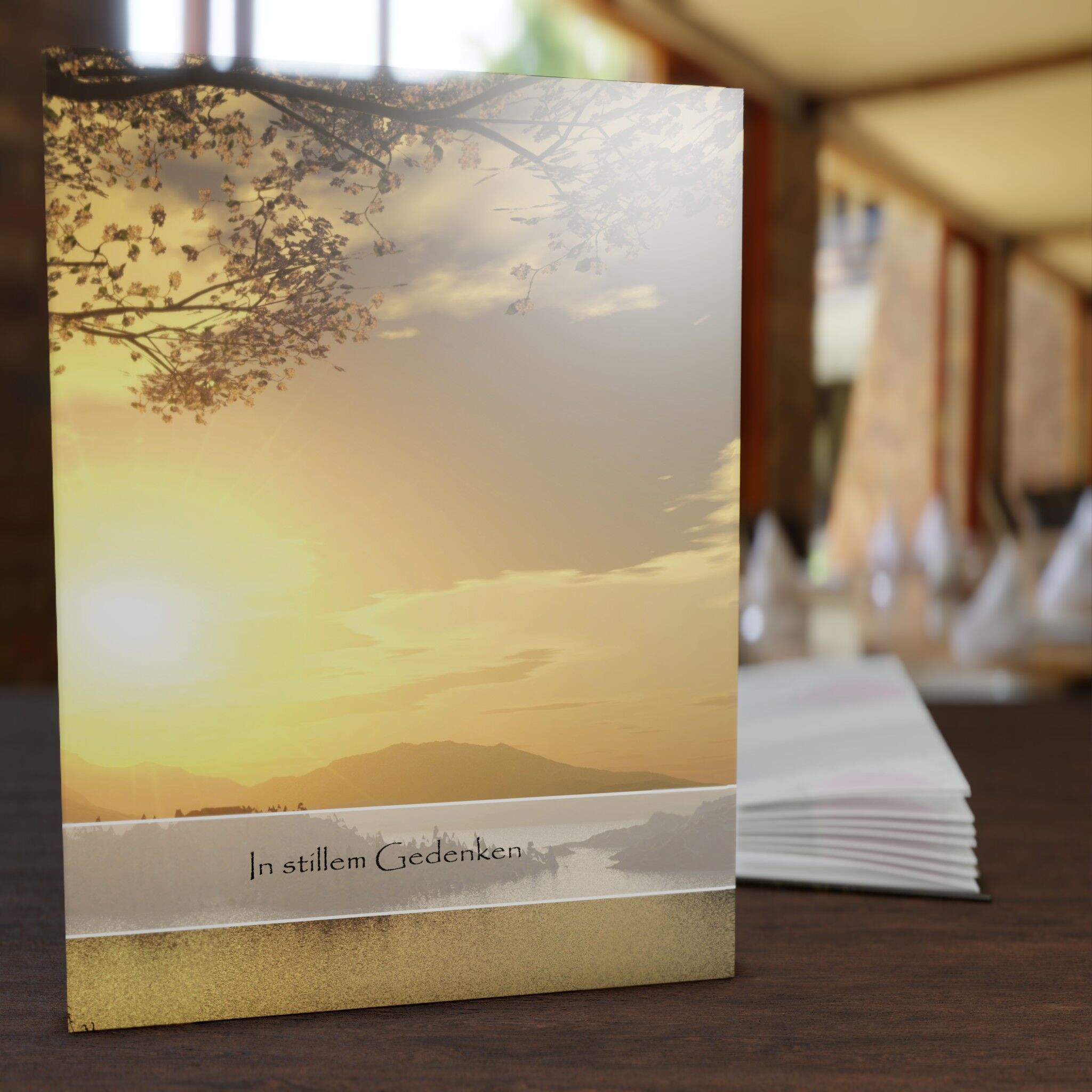 Kondolenzbuch Sonnenuntergang mit warmem Motiv als Symbol für Abschied und Hoffnung