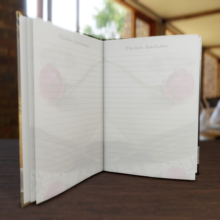 Kondolenzbuch Sonnenuntergang mit warmem Motiv als Symbol für Abschied und Hoffnung